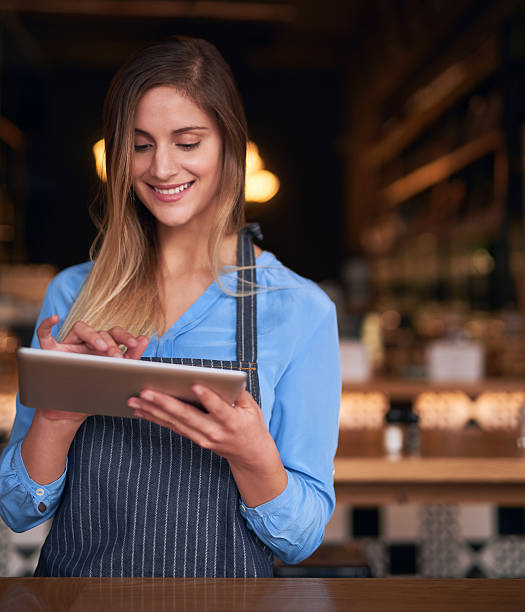 istock Managing her business online 637778014