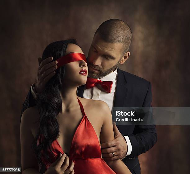Sexy Couple Love Kiss Fashion Man Kissing Sensual Woman Blindfold Stock Photo - Download Image Now