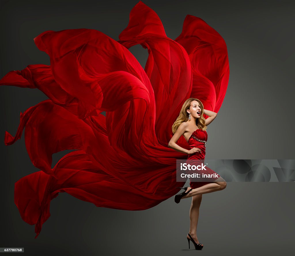 Fashion Model Red Dress, Woman Dancing Flying Fabric Waving Cloth Fashion Model Red Dress, Woman Dancing in Flying Fabric Gown, Waving Fluttering Cloth Red Stock Photo