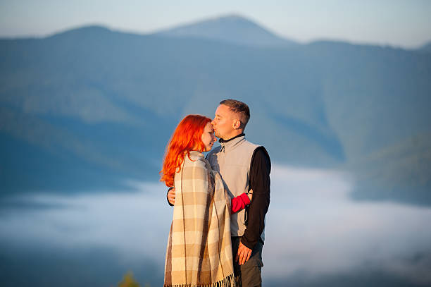 istock Couple tourists kissing and hugging each other 637781204