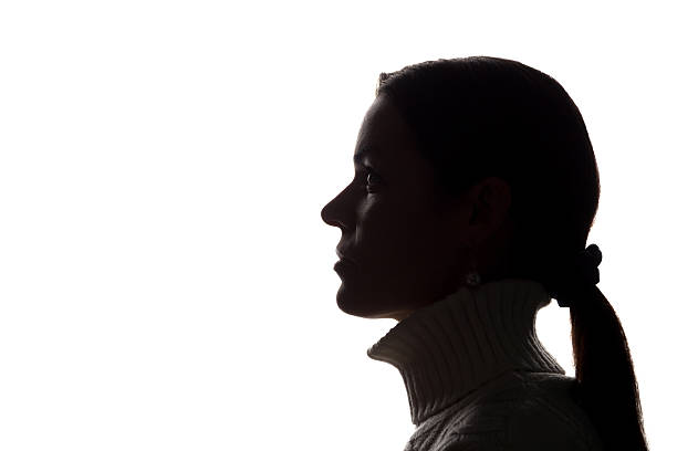 istock Young woman look ahead - horizontal silhouette 637783102