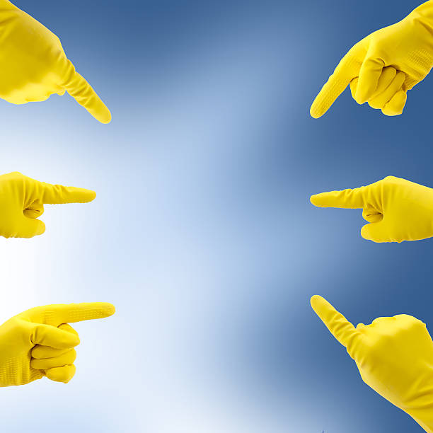 istock Gloves Pointing To The Middle 637783122