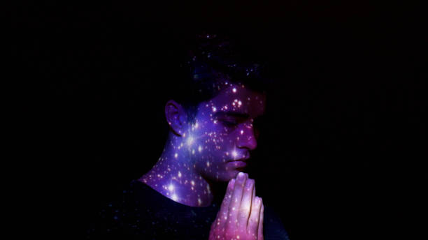 istock Projection of stars on a man's face 637783422