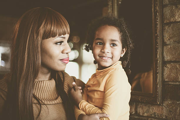 African mother and daughter.