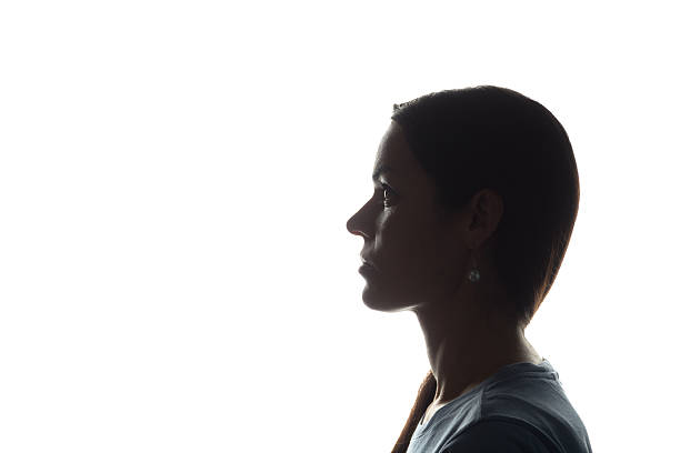 istock Young woman look ahead - horizontal silhouette 637783750