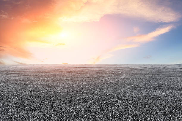 istock Asphalt road and sky at sunset 637784164