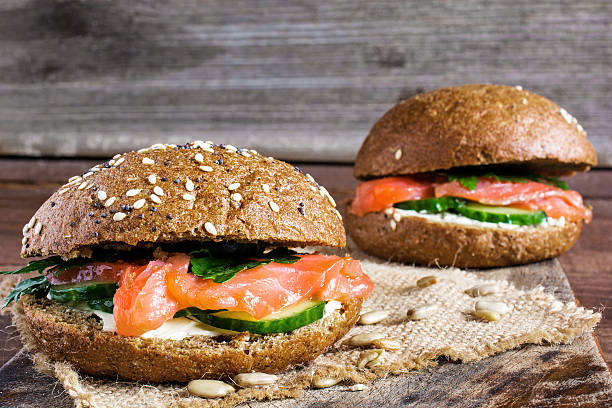 istock two sandwiches with cereals bread and smoked salmon with herbs, 637785156
