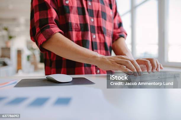 Man Hands Typing On Computer Keyboard Stock Photo - Download Image Now - Desk, Business, Close-up