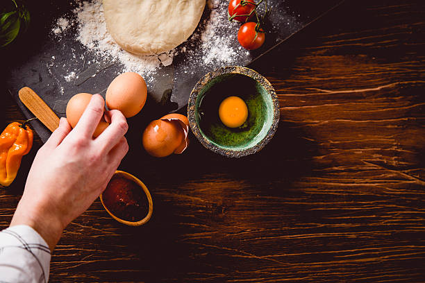 istock Fresh an tasty homemade pizza preparation 637786200