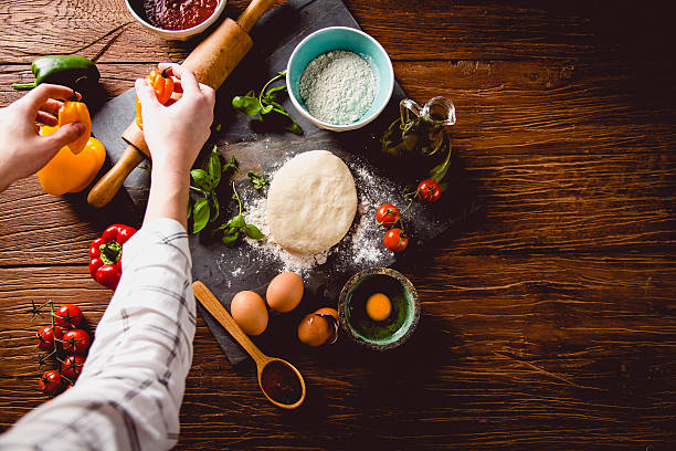 istock Fresh an tasty homemade pizza preparation 637786732