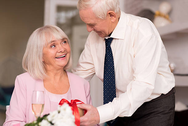 istock Magnificent smiling woman receiving a present 637786784