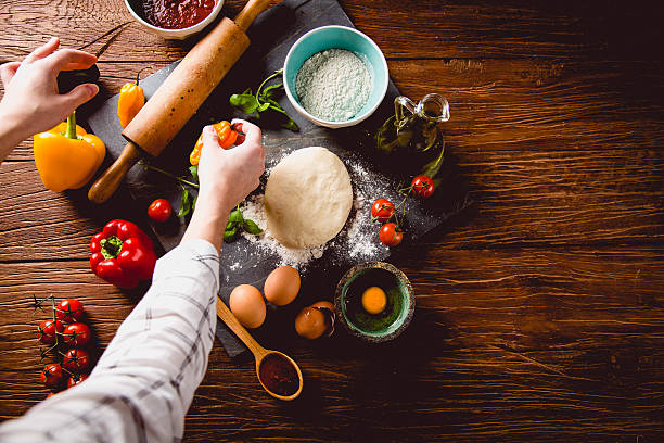 istock Fresh an tasty homemade pizza preparation 637787034