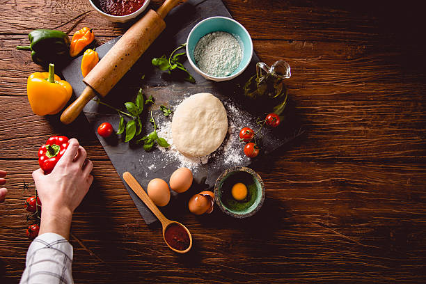 istock Fresh an tasty homemade pizza preparation 637788160