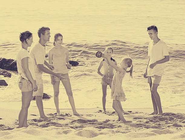istock Parents with four children playing 637789282