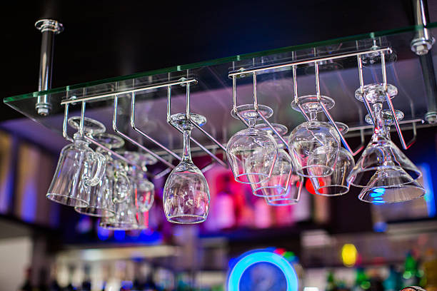 istock glasses in shelf above a bar rack 637790472