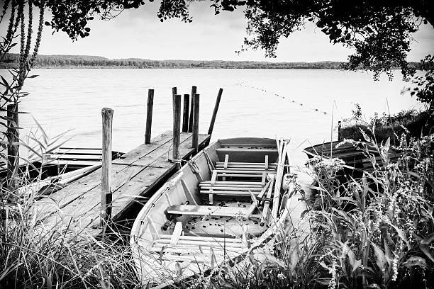 istock Rowing boat at the pontoon at the lake 637792326