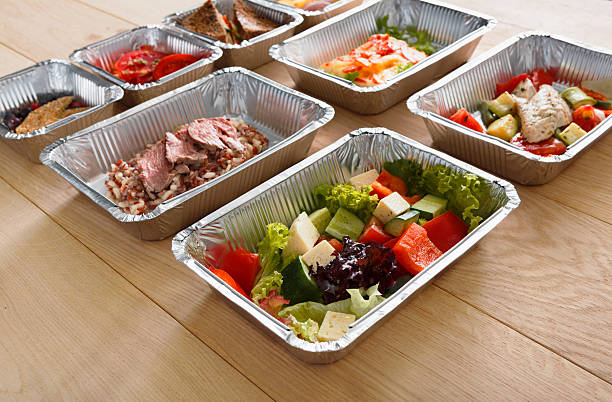 istock Healthy food in boxes, diet concept. 637796792