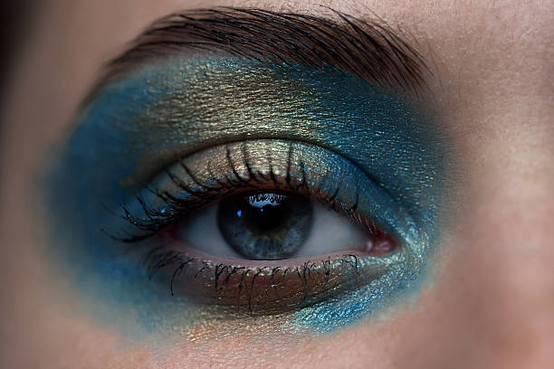 istock Colorful eye makeup closeup. 637797218