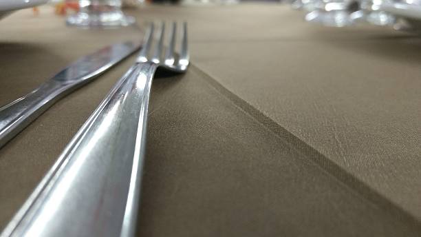 istock Fork and Knife Close-Up in Perspective on the Table 637797330