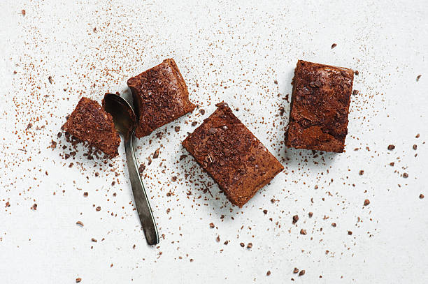 istock Brownie pieces sprinkled with chocolate chips and cocoa 637801664