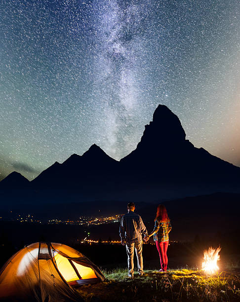 istock Family enjoying starry sky 637801912