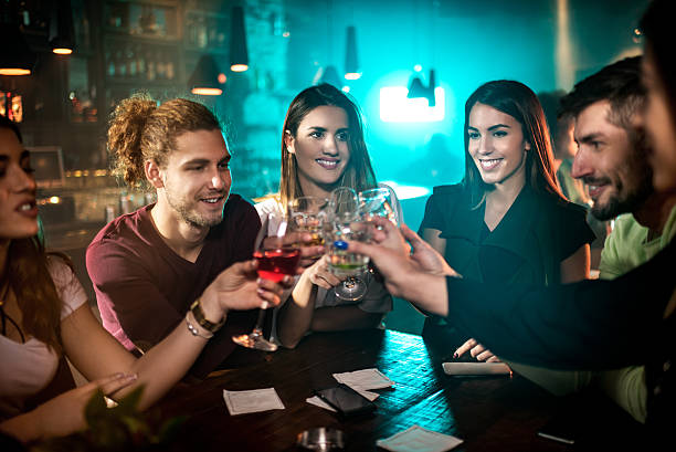 istock Group of people in the bar 637804412