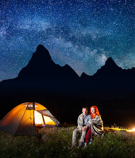 istock Sweety couple tourists covered with a plaid 637807338