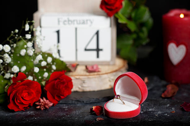 istock cube calendar and  red rose flower 637810468