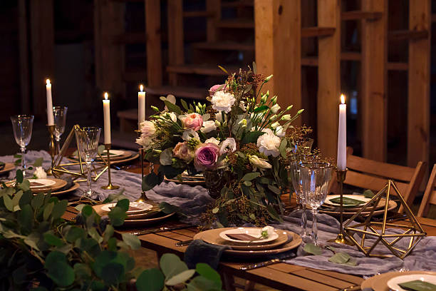 istock Decoration wedding table before a banquet in a wooden barn. 637810958