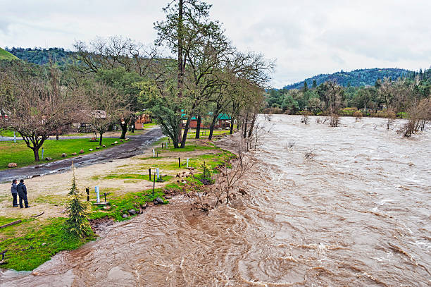 River Overflowing Its Banks During Rainy Season.