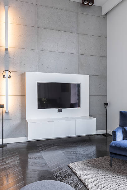 istock Television in grey living room 637813710