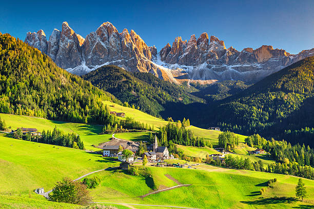 Stunning spring landscape with Santa Maddalena village, Dolomites, Italy, Europe Famous best alpine place of the world, Santa Maddalena village with magical Dolomites mountains in background, Val di Funes valley, Trentino Alto Adige region, Italy, Europe dolomite photos stock pictures, royalty-free photos & images