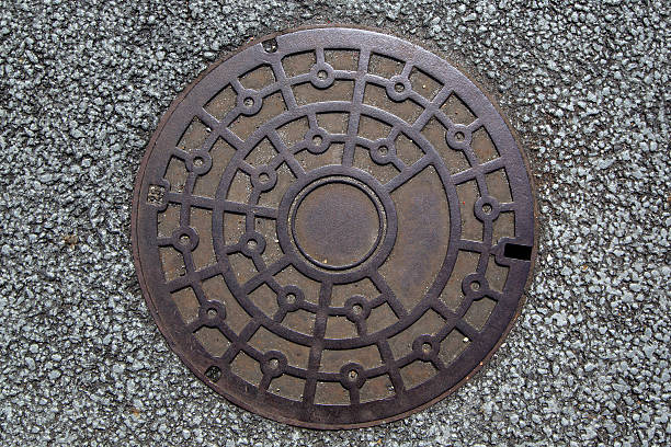 istock Circle steel manhole cove 637817076