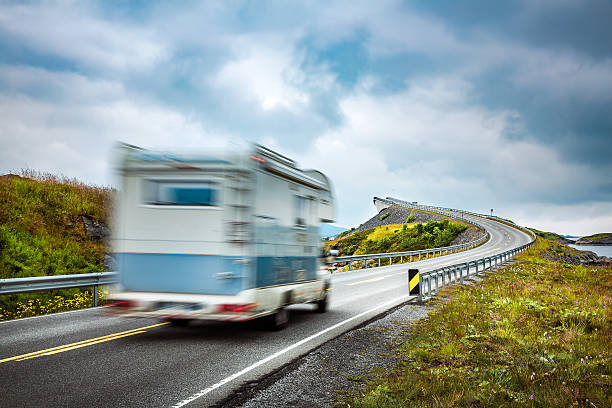 istock Norway. Caravan car travels on the highway. 637817384