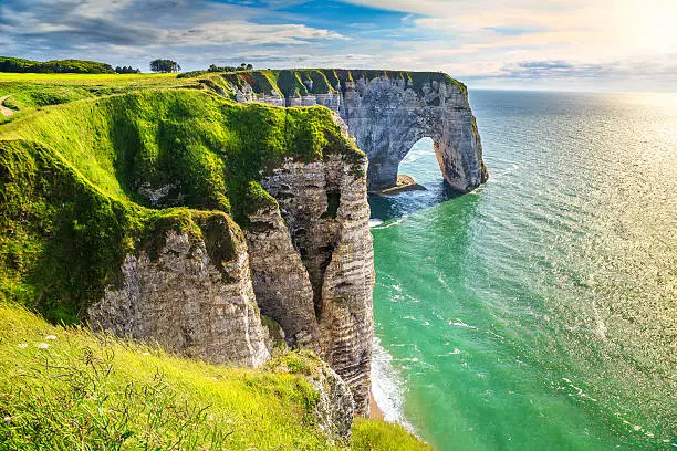 Spectacular natural cliffs Aval of Etretat and beautiful famous coastline, Normandy, France, Europe