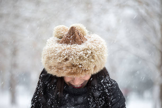 istock Smiling winter woman with hat 637818778