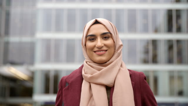 Portrait Of British Muslim Businesswoman Outside Office