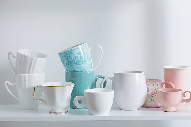 istock Clean dishes on white wooden shelf 637819998