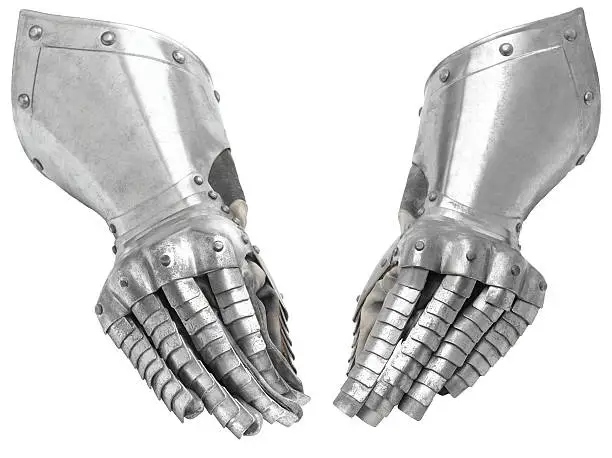 Two metal knight's gloves isolated on white background. Studio high image quality.