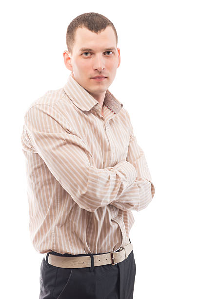 istock serious young man in a shirt posing 637820772