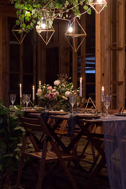istock Decoration table before a banquet in a wooden barn. 637821808