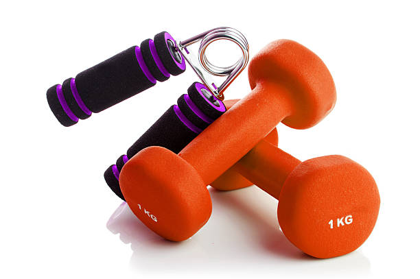 istock Two of dumbbells with the simulator for hands 637823248