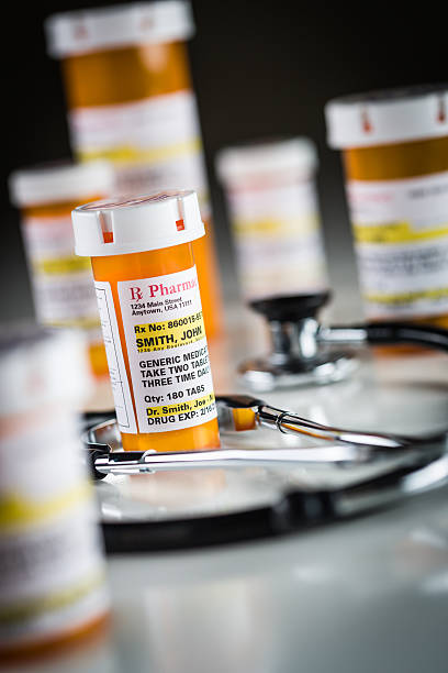 istock Non-Proprietary Medicine Prescription Bottles Abstract with Stet 637823488