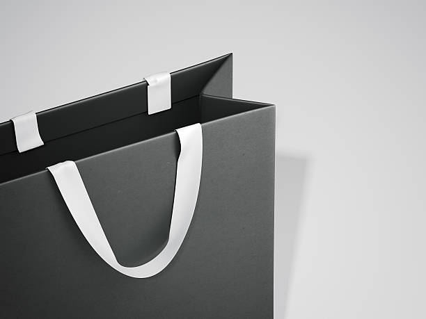 istock Black shopping bag with white handles. 3d rendering 637824250
