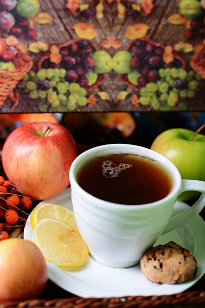 istock Tea in a white cup. The cup stands on a white saucer. 637825244