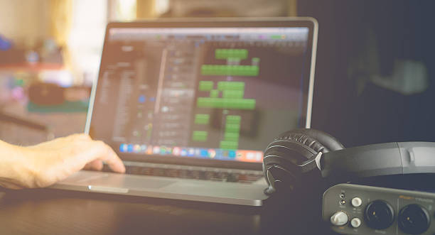 10 Ways to Optimize Your Computer for Music Production 15 electronic musician is produce music on his laptop