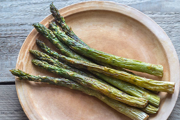 istock Roasted asparagus on the plate 637828284