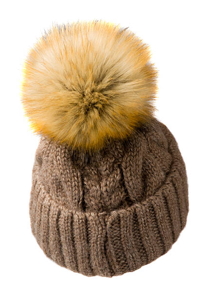 istock Women's knitted hat isolated on white background.hat with pomp 637835920