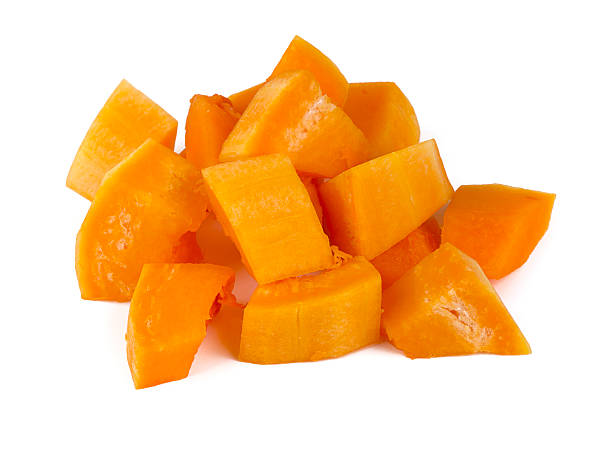 istock pieces of pumpkin isolated on white 637836470