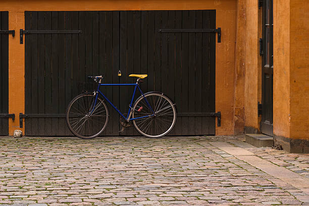 istock Racing bicycle parked in front of the garage 637837748